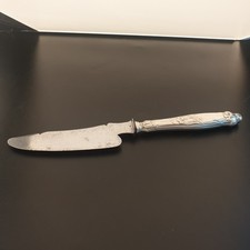 Beau couteau à beurre Manche