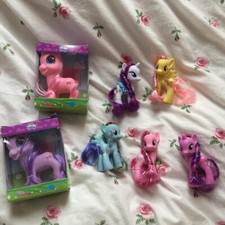 Lot de 7 jouets pour poupée