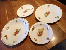 Lot de 4  plats ronds creux