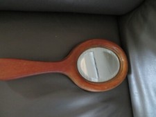 antique hand hinged mirror and