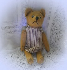 OURS ANCIEN  INTERIEUR PAILLE YEUX EN VERRE DEBUT XX é SIECLE  vers 1920