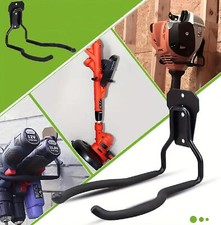 Support mural pour débroussailleuse