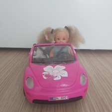 Lot poupée, voiture rose et
