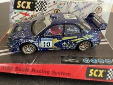 voiture de circuit slot car1/32e: SCX Subaru Impreza WRC