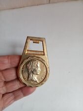 ouvre capsule avec éffigie de