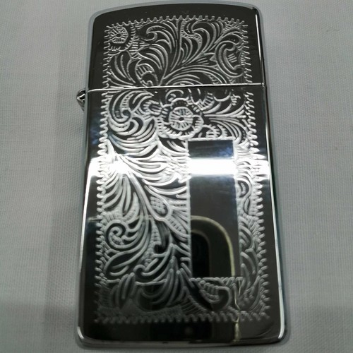Briquet huile zippo - à,