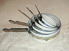  Ancienne série de 5 casserole en porcelaine /métal décor florale  déco cuisine 