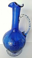 Verrerie, Vase en verre soufflé de Murano, décor taillé.