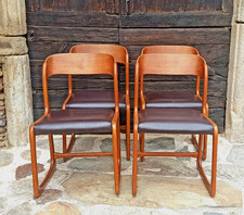 4 chaises traineau Baumann années 70 assise simili cuir 