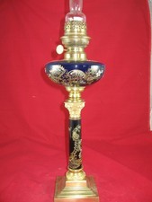 lampe à pétrole porcelaine émaillée bronze