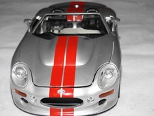 voiture miniature SHELBY SERIES 1 de 1999 1/18 BURAGO