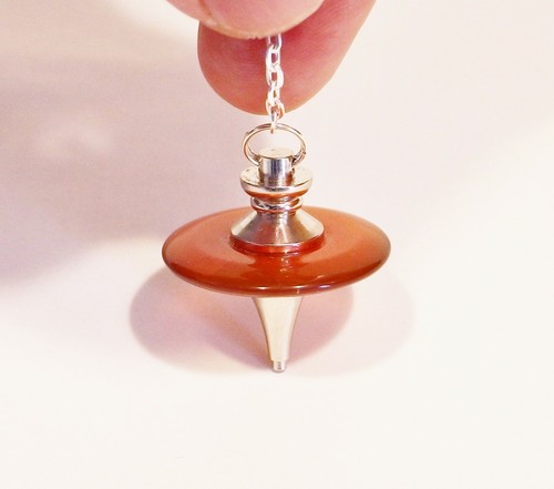 Pendule disque en cornaline - *,