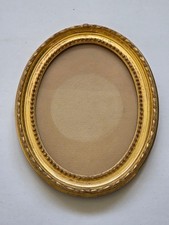 Cadre médaillon doré ovale
