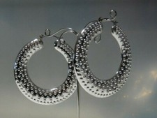 BOUCLES D'OREILLES EN FORME D