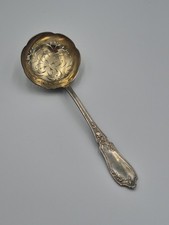 Cuillère a saupoudrer en