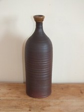 + Bouteille en terre cuite