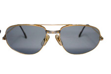 Lunettes de soleil Cartier Trinity monture dorée à monture pleine larme...