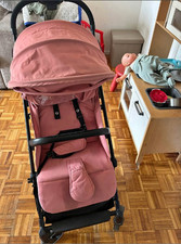 Poussette rose bon état