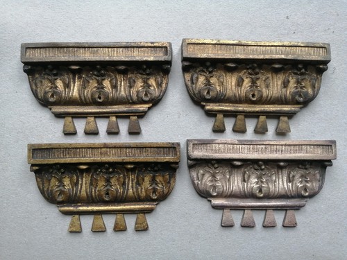 Quatre decorations bronze - quatre,