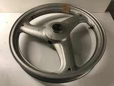 UNE JANTE ROUE AVANT FRONT RIM GRISE MOTO HONDA 125 VARDERO 2005 65S 18X2.15 