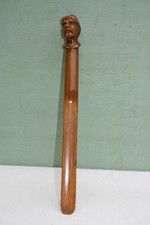 outil en bois ancien à tête