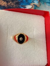 Chevalière or 750/00 en Onyx avec un diamant