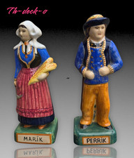 MARIK PERRIK PAIRE DE PERSONNAGES FAIENCE HENRIOT QUIMPER HT.23CM. DATE 1934