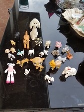 Lot de 22 figurines chiens.