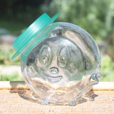 Bocal à bonbons en verre tête avec chapeau en plastique turquoise