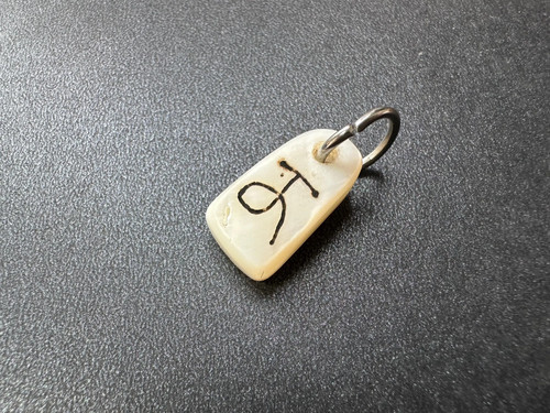 Pendentif coquillage conque