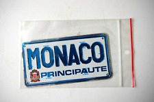 +UN AUTOCOLLANT PRINCIPAUTE DE