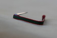 Fixe ruban rappel boutonnière