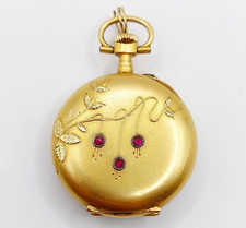 Pendentif montre de col victorien or rose 18k motif feuilles et rubis (1880)