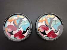 Paire de dessous de bouteilles