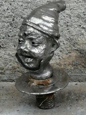 Ancien bouchon mascotte publicitaire metal personnage