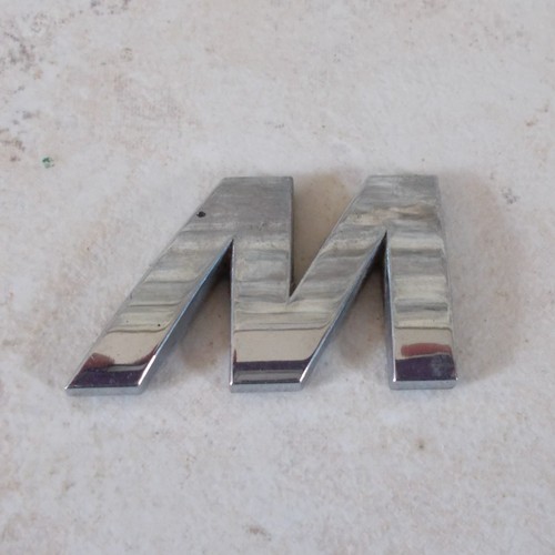 Ancien insigne ancienne lettre
