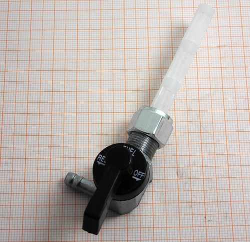 Petcock m12x1 gauche sortie - à,