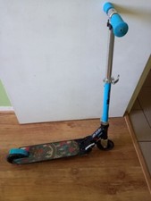 Trottinette bleue marque Oxelo Mid 1 taille 6 à 9 ans