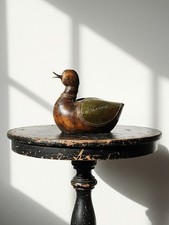 Petit canard en bois sculpté