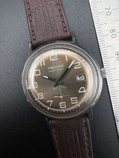 Montre ancienne vintage mécanique en acier 1970 Fresard homme femme 34mm date