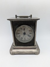 Réveil. Pendule d'officier. En l'état , à restaurer. Ne fonctionne pas.