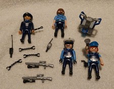 lot pièces  Playmobil personnage policier arme menotte gyropode carabine talkie