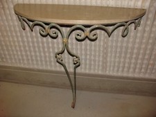 Console murale époque Art Déco en acier peint vert et or et marbre beige