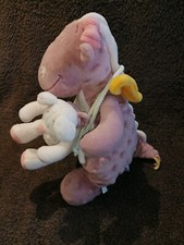 Doudou peluche musicale dragon