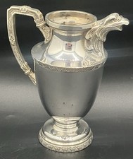 Verseuse métal argenté Apollo bec tête d’aigle décor Empire