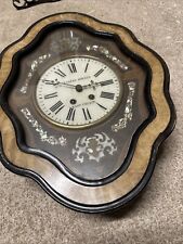 Ancien œil de bœuf pendule