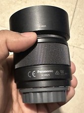 Objectif pour Hybride PANASONIC 25mm f/1.7 noir Lumix G h-H025  protection, hood