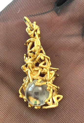 Pendentif métal doré et - en,
