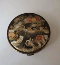 Poudrier Coty à décor japonisant, plein de sa  poudre d'origine 