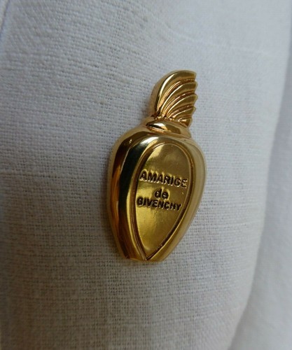 Pin broche parfum amarige de - pin's,